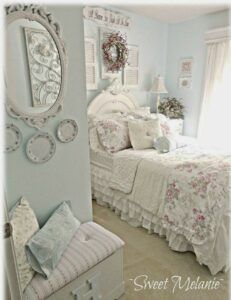Shabby chic bedroom with layers of ruffles on bed.