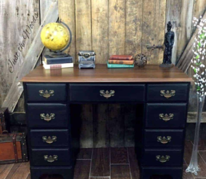 Wooden desk in navy blue.